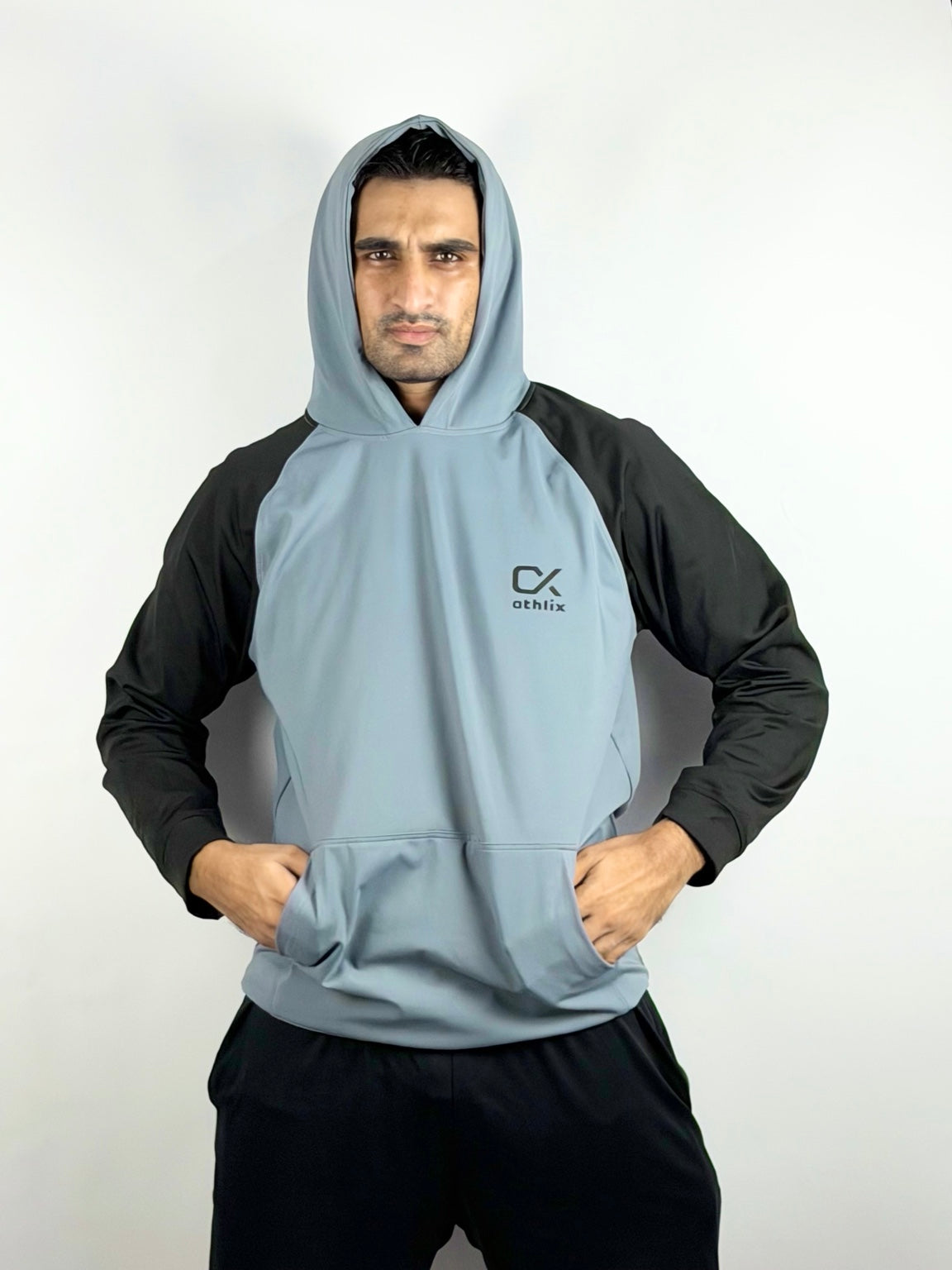 Athlix grey and black performance hoodie front view with hands in pocket